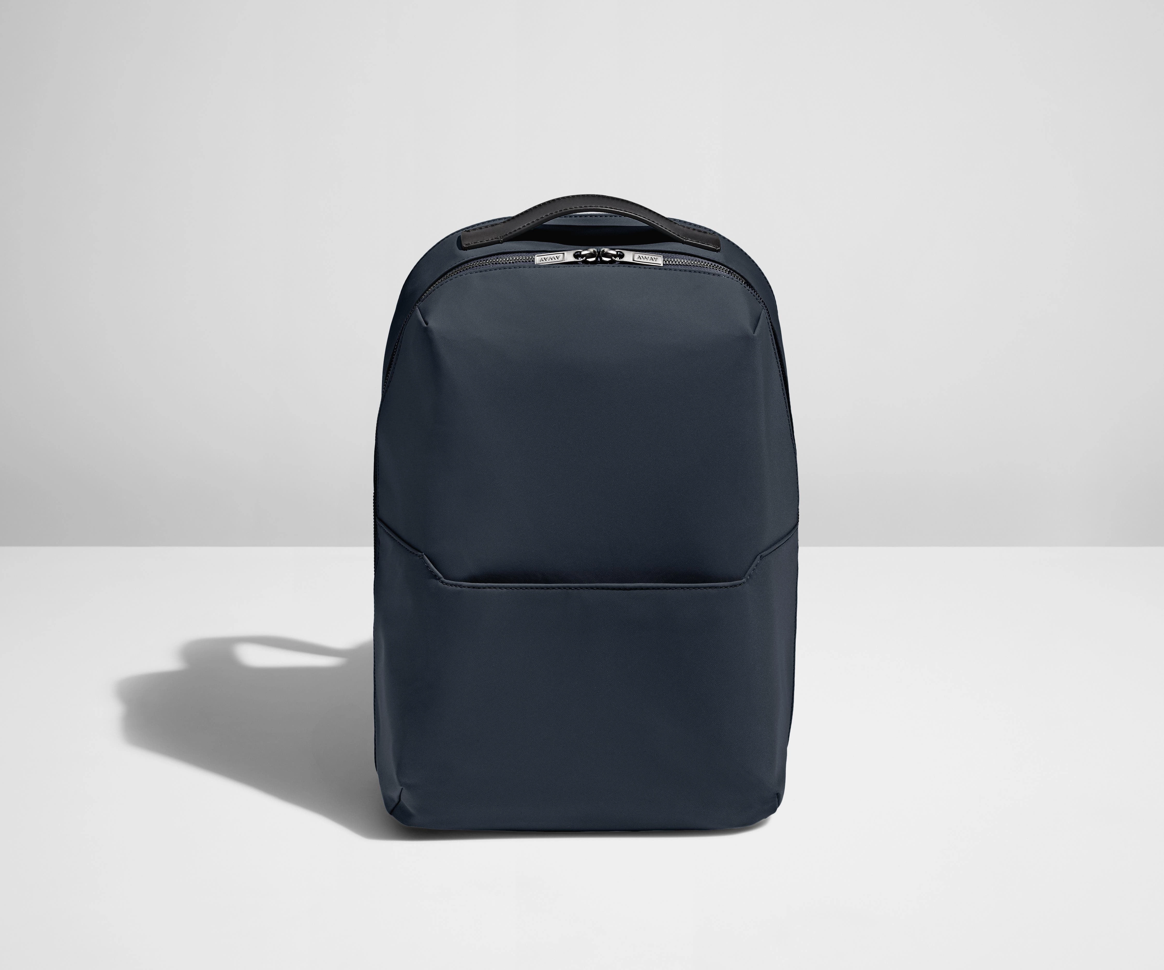 The Everywhere Zip Backpack in Navy Blue Ergonomic grip Safari Drive