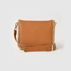 Practical Function Great for on-the-go individuals with busy lifestyles Shearling Crossbody - Sand